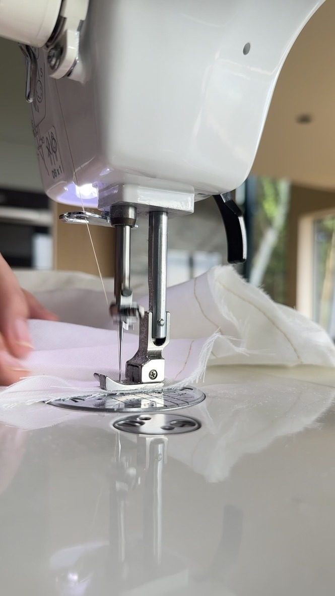 Fabric being sewn in the studio